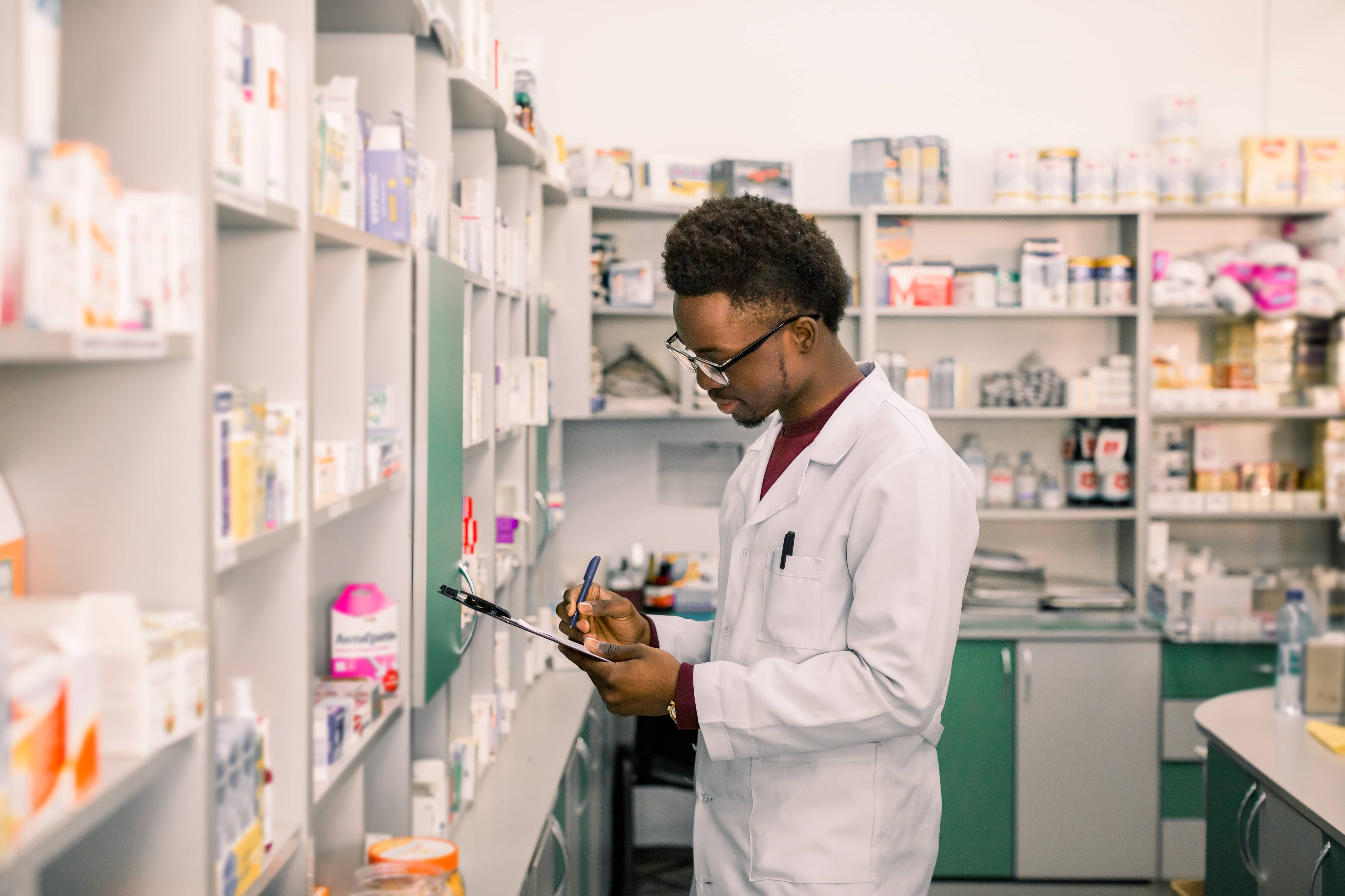 Allied travel professional in a pharmacy.